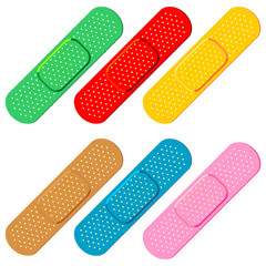 Colorful bandages on white background