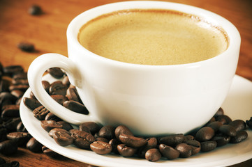 Coffee beans and cup