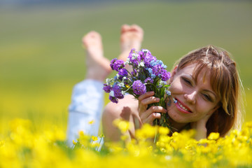 The girl with a bunch of flowers