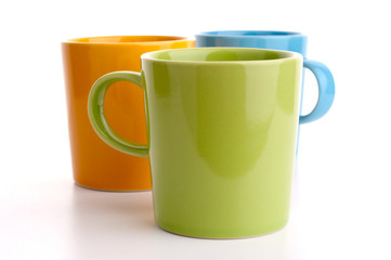 Colored cups. Isolated on white background.