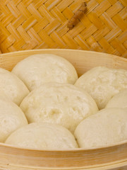 Chinese steamed roll. Close up on white background