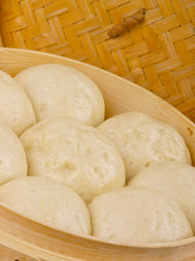 Chinese steamed roll. Close up on white background