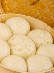 Chinese steamed roll. Close up on white background