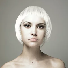 Fotobehang Beautiful young woman with blond hair © Egor Mayer