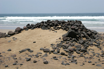 Fototapeta na wymiar stone shelter on beach
