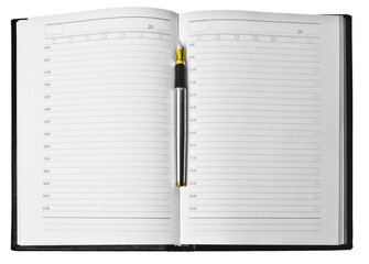 business organizer on white background with pen