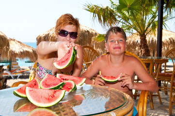 Woman eating watermelon