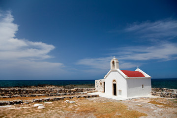 Greek Crete coastline with church and cliffs