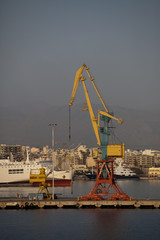 Fototapeta na wymiar Port cranes in Iraklion