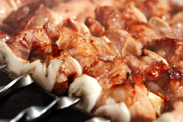 Meat slices prepare on fire