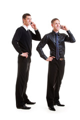 two businessmen talking on the phone