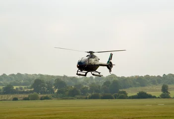 Foto auf Acrylglas Antireflex EC-120 Hubschrauber schwebend © meoita
