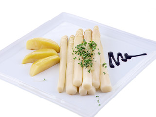 white asparagus with boiled potatoes and cress