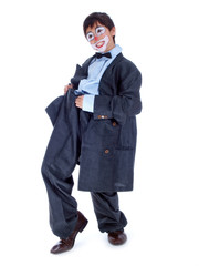 cute smiling boy wearing oversized business suit