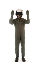 Military pilot marshalling aircraft