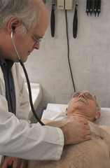 Obraz na płótnie Canvas Doctor Examining Patient