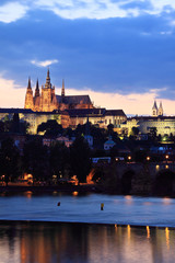 Fototapeta premium View on Prague with gothic Castle after Sunset