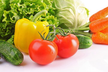 Fresh vegetables on white