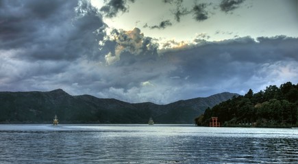 Torii in a water and ashi lake, Japan