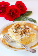 Cake with walnuts and coconut icing