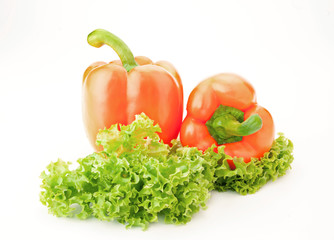 Orange sweet  peppers and salad over white