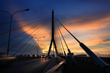 Fototapeta na wymiar Cable bridge at twilight