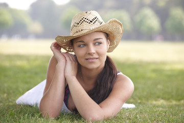 girl wearing summer hat