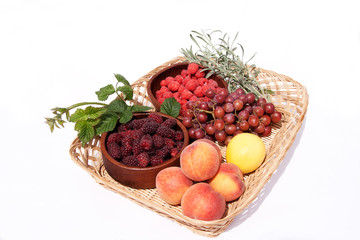basket with bowls of fresh fruit