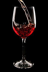 Red wine being poured