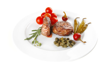 roast meat medallion with cherry tomatoes