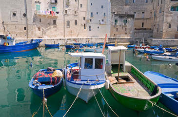 Boats moored in Monopoli old port. Apulia.