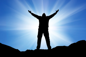 Silhouette of man and sunshine
