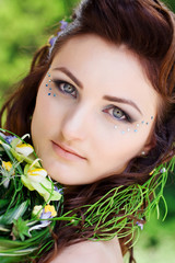 beautiful bride with a wedding bouquet