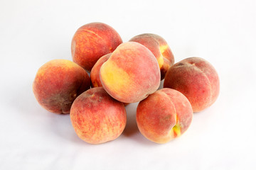 Fresh peaches - isolated on white