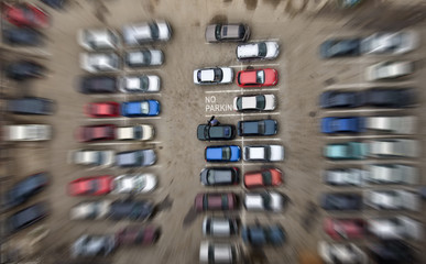 Parking for cars. Falling from height and motion blur.