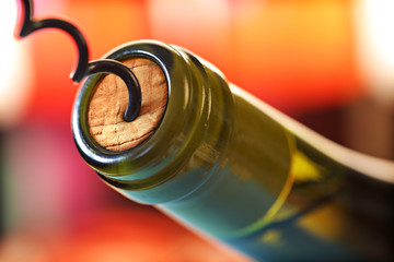Cork screw and wine bottle - obrazy, fototapety, plakaty