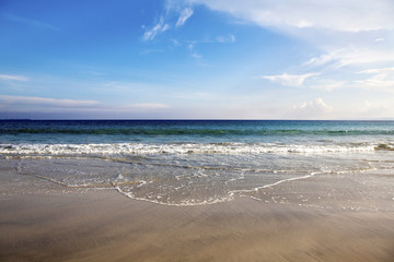 Fototapeta na wymiar Waves lapping on the beach.