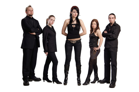 Group of posing young men and women looking in camera isolated