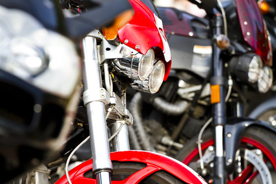 Motorbike's chromed engine. Bikes in a street