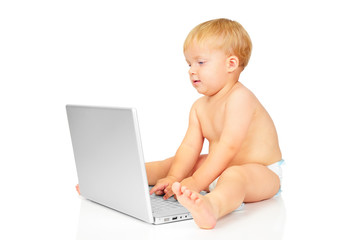 Cute little baby boy with notebook