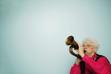 Woman Plays Horn