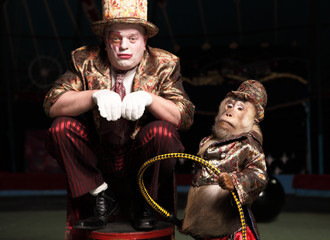Circus clown with a monkey. © Unique Vision