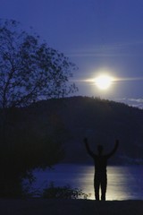 Person Enjoys Moonlight