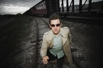 Man Runs Alongside A Train