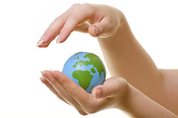 Woman's Hands Protecting Globe