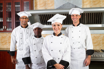 group of chefs in kitchen