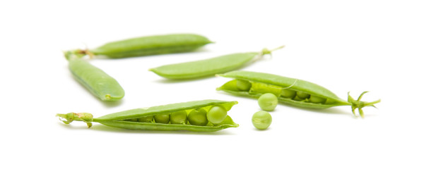 fresh green peapods on white surface; isolated