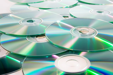 heap of dvd, cd disks - 23984698