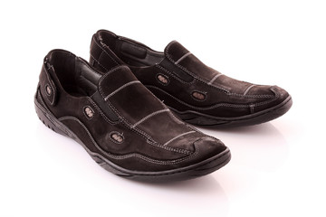 Pair of man's black shoes isolated on white background