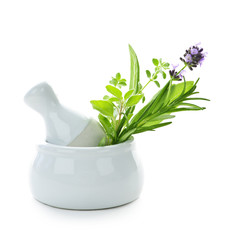 Healing herbs in mortar and pestle - obrazy, fototapety, plakaty